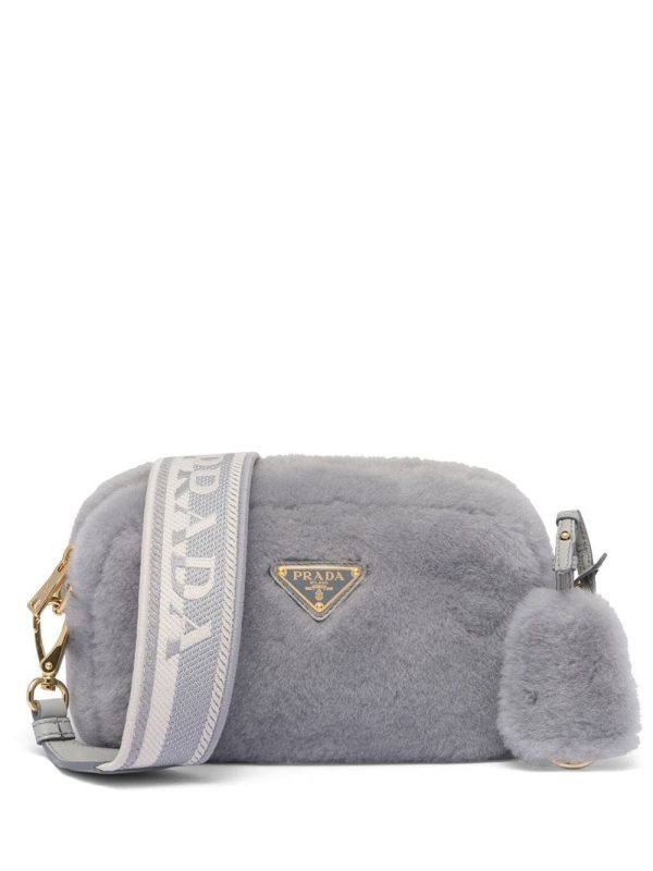 Prada triangle-plaque shearling shoulder bag