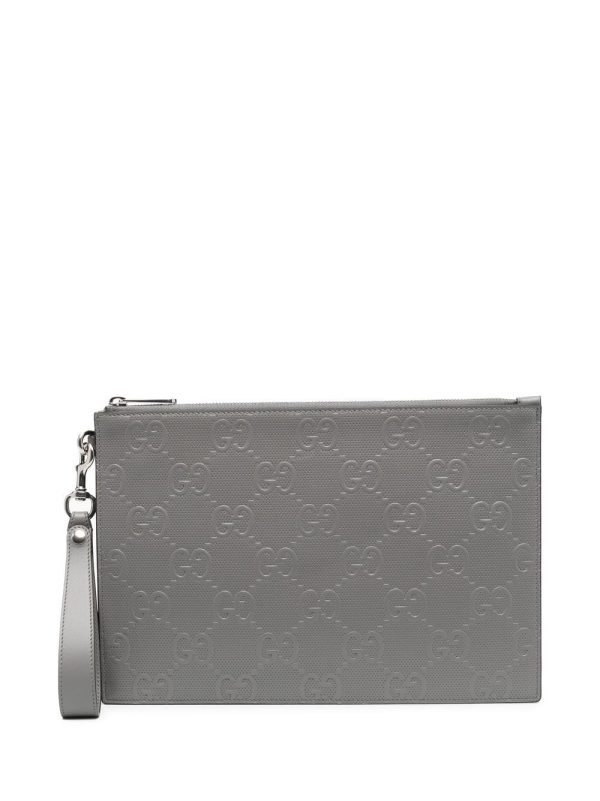 Gucci GG monogram-embossed clutch