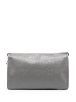 Gucci GG monogram-embossed clutch bag