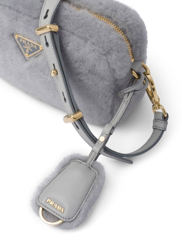 Prada triangle-plaque shearling shoulder bag - Image 4