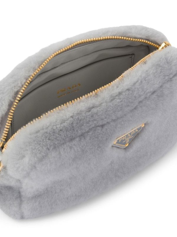 Prada triangle-plaque shearling shoulder bag - Image 5