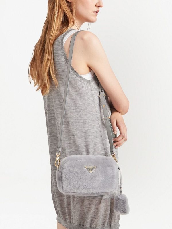 Prada triangle-plaque shearling shoulder bag - Image 6