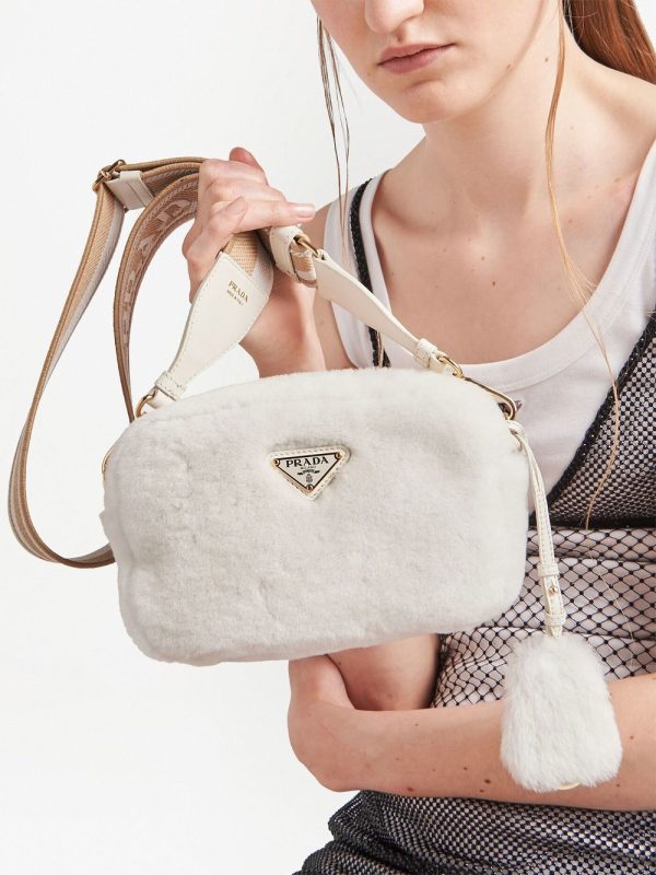 Prada triangle-plaque shearling shoulder bag - Image 6